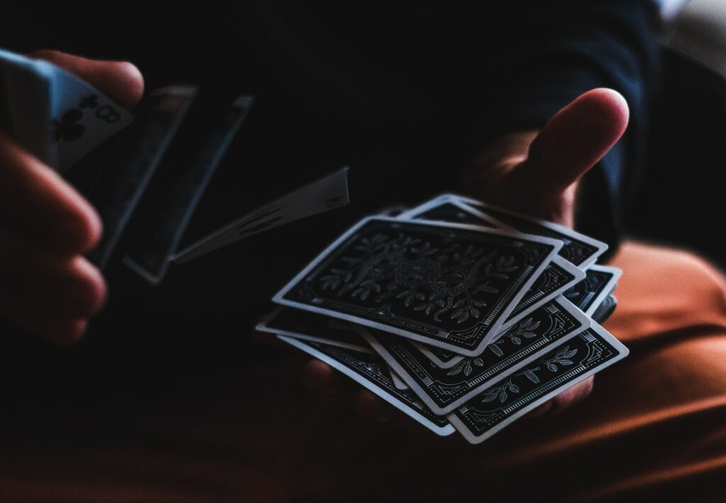 Hands Shuffling a Deck of Cards